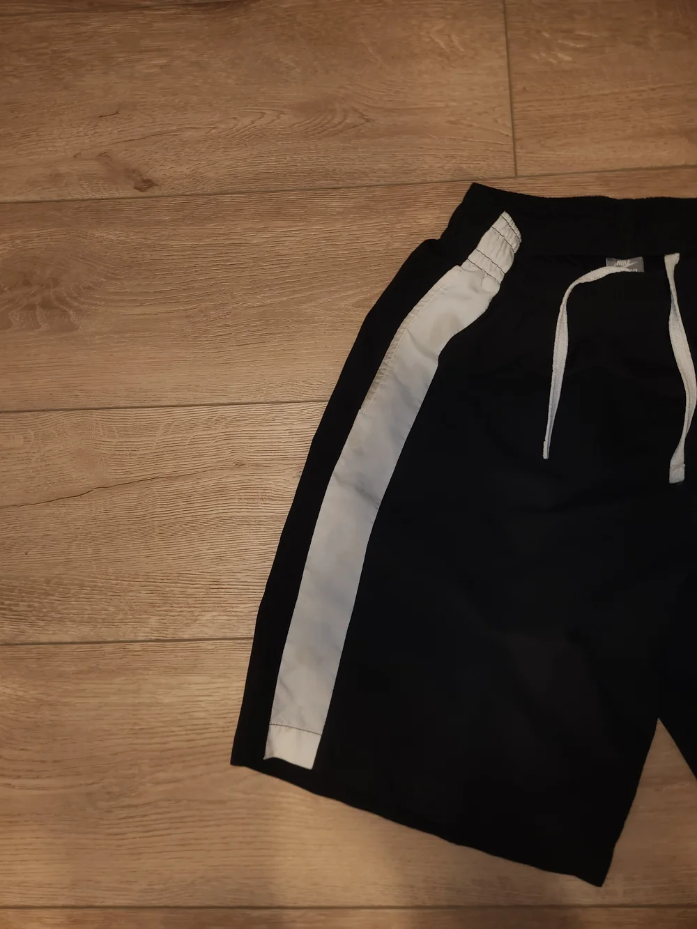 Nike Men's Black Shorts with White Side Stripe